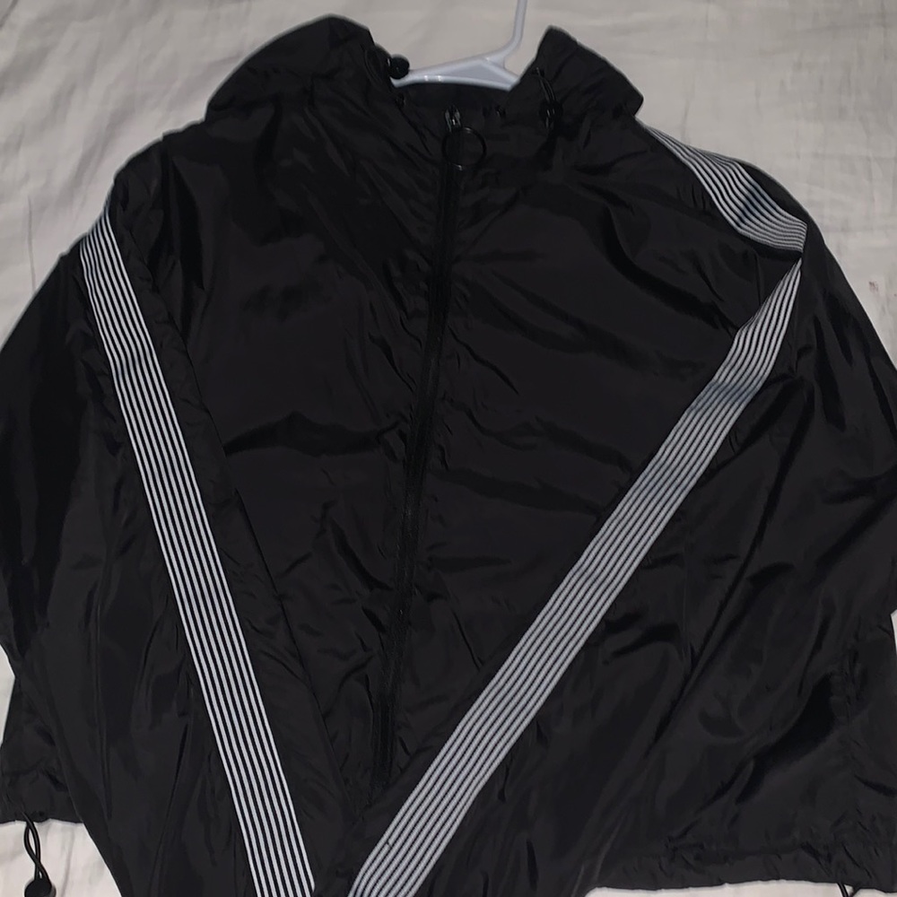 Black windbreaker